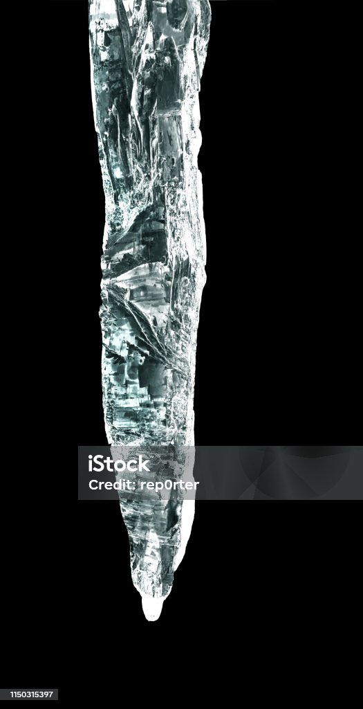 icicles big icicle isolated in black Ice Stock Photo