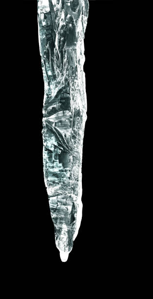 icicles big icicle isolated in black stalactite stock pictures, royalty-free photos & images
