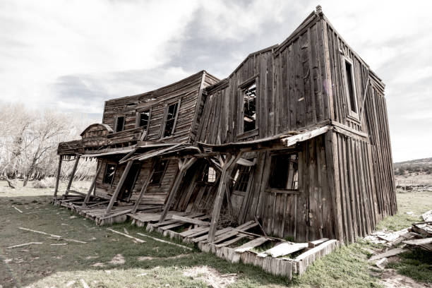 istock Old saloon from the wild west falling down into the ground 1150317234
