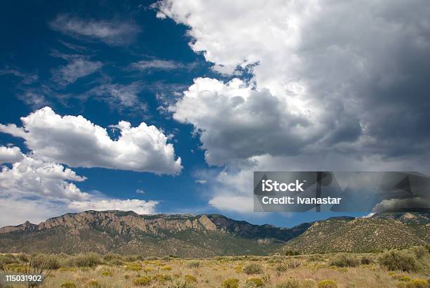 Dramatic Cumulus Clouds Over Sandia Mountains In New Mexico Stock Photo - Download Image Now