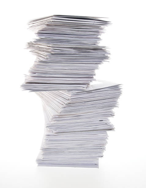 istock Big Stack of Unpaid Bills and Envelopes Isolated on White 115031917
