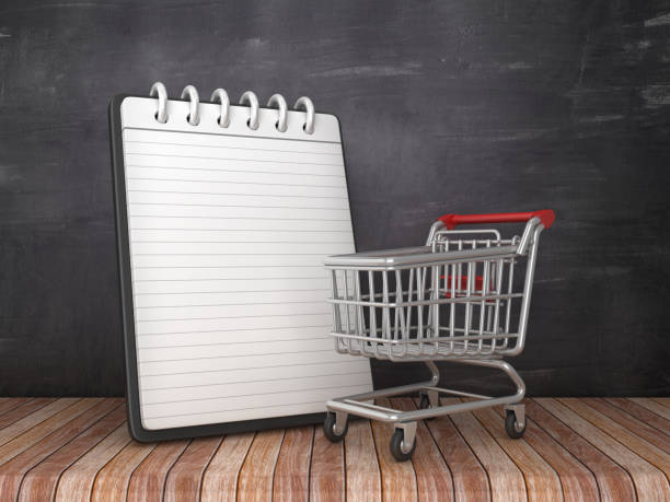 istock Note Pad with Shopping Cart on Chalkboard Background - 3D Rendering 1150320074