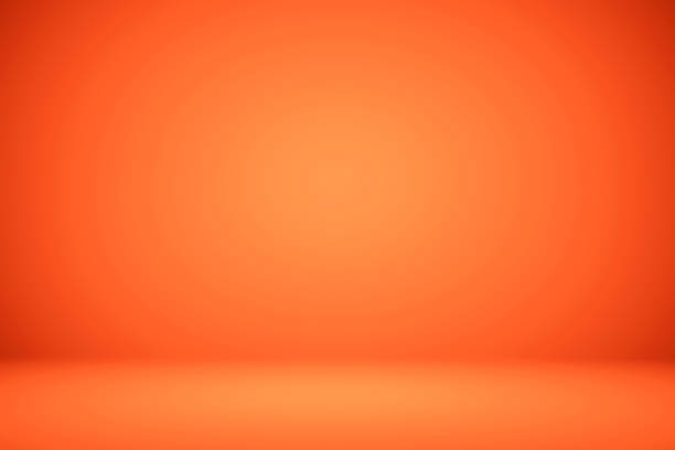 empty orange studio room, used as background for display your products - color display imagens e fotografias de stock