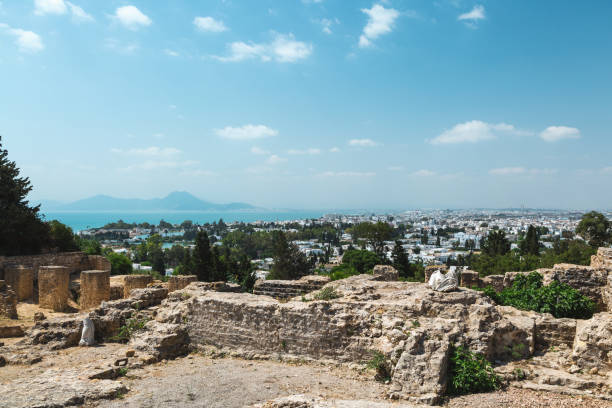 Wonderful view of the ruins of Antonin's thermal baths at Carthage by the sea with blue sky in background, Tunisia