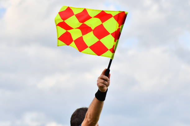 Assistant referee or Lineman of football or soccer holding flag Assistant referee or Lineman of football or soccer holding flag offside stock pictures, royalty-free photos & images