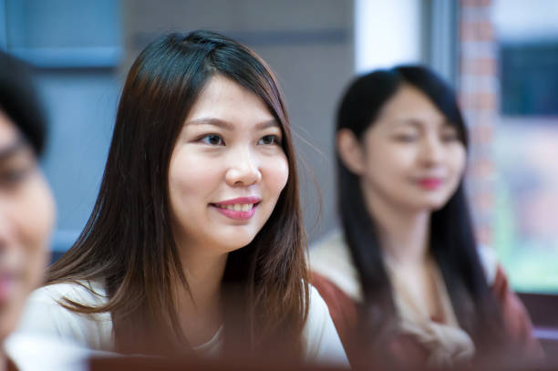 istock Young female student smiling and showing confidence in her study 1150326206