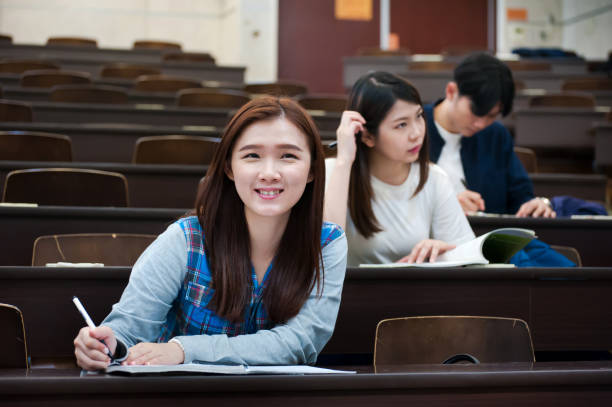 istock Young female student smiling and showing confidence in her study 1150329450