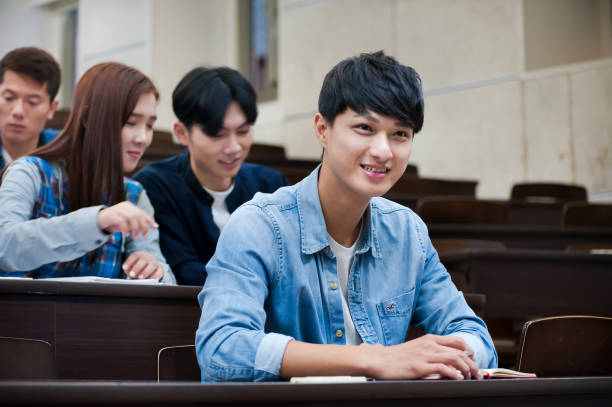istock Young male student smiling and showing confidence in his study 1150329552