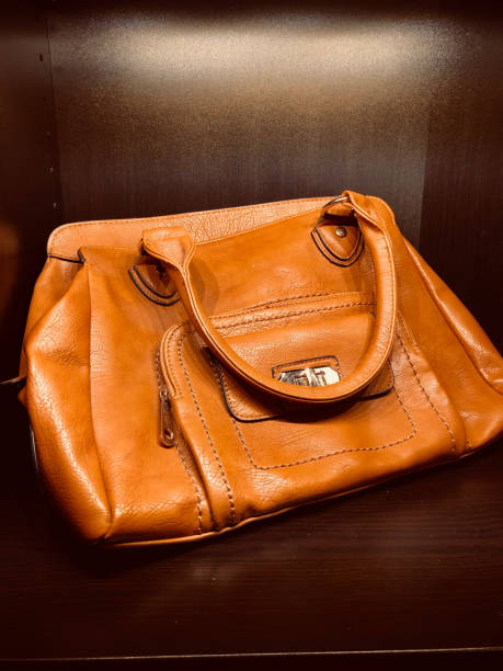 istock Fashionable bag in the shelf 1150330322