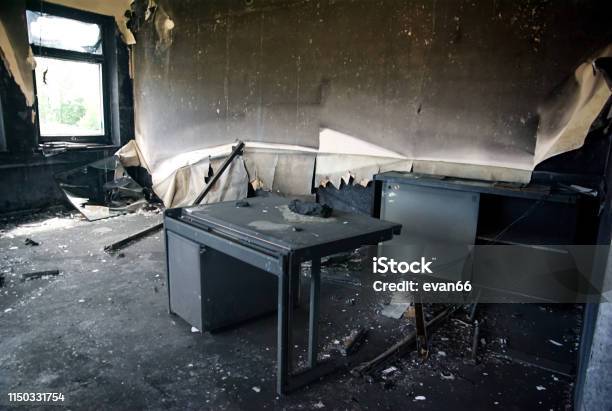 Burned Interiors And Furniture In Industrial Building Stock Photo - Download Image Now