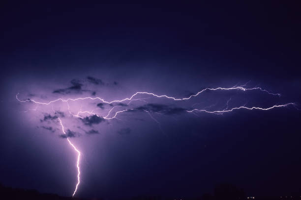 istock A strong flash of lightning in the sky while a strong storm hits the area between Amsterdam and Rotterdam, Holland 1150333359