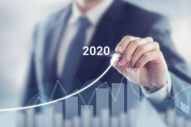 Growth success in 2020 concept. Businessman plan and increase of positive indicators in his business. Growth success in 2020 concept. Businessman plan and increase of positive indicators in his business. 2020 stock pictures, royalty-free photos & images