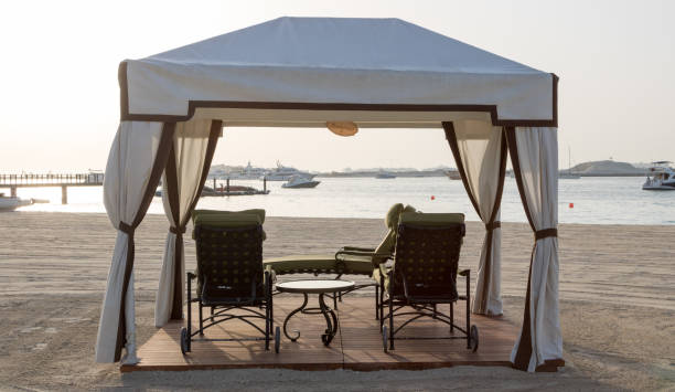 istock Luxurious gazebo on the beach 1150337461
