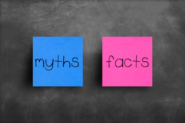 istock Sticky note on blackboard, Myths Facts 1150341139