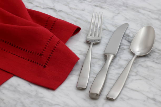 istock beautiful silverware on linen napkin 1150341573