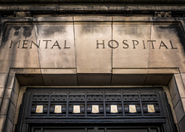 istock Old Mental Hospital Sign 1150342736