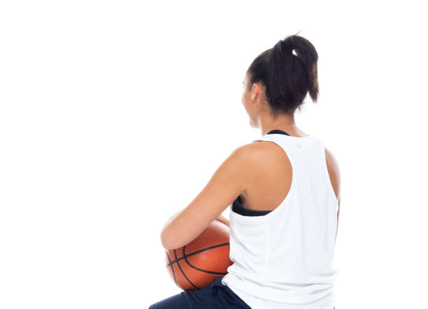 istock African American basketball player on white background - sitting 1150343692