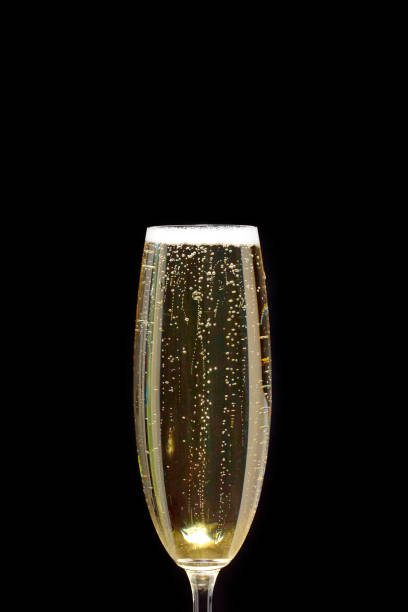 黒い背景にシャンパンのグラスの泡 - champagne celebration glass black ストックフォトと画像