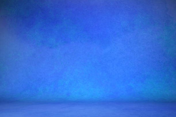 istock photo background blue. textured wall rolling in the floor. studio photography background illuminated by the directed light fabric painted canvas 1150345084