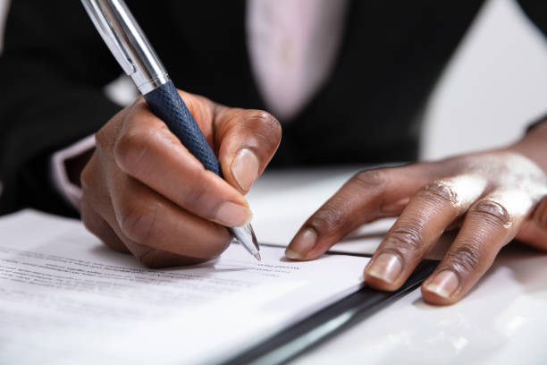 istock Woman Signing A Contract 1150345116