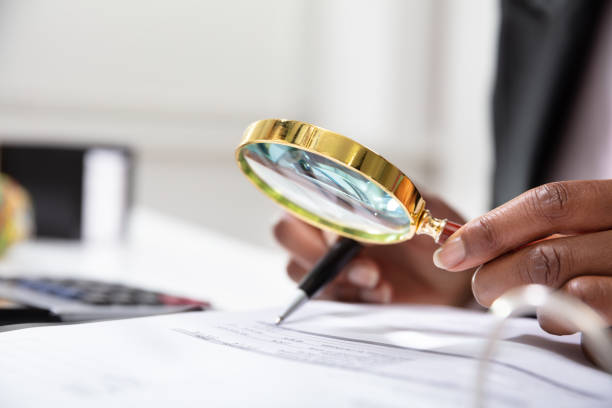 istock Businessperson Examining Bill 1150345147
