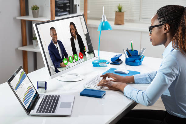 istock Businesswoman Videoconferencing With Her Colleagues 1150345171