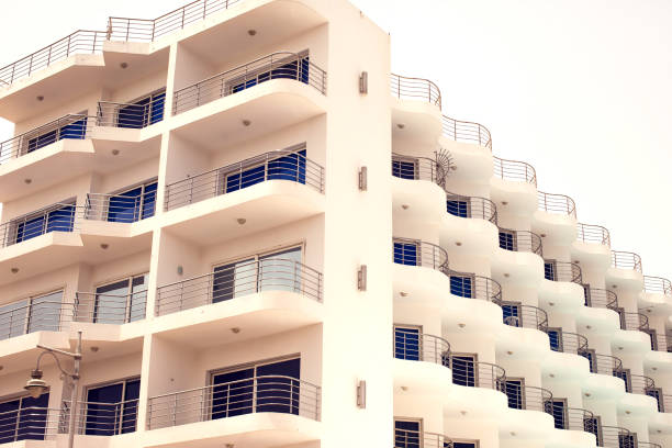 istock White color building with balcony. Architecture and design concept 1150345333