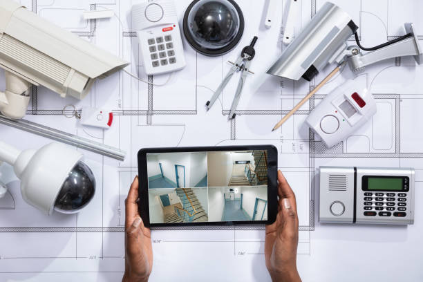 istock Person Watching Footage On Tablet With Security Equipment 1150345361
