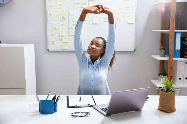 istock Businesswoman Stretching Her Arms 1150345407