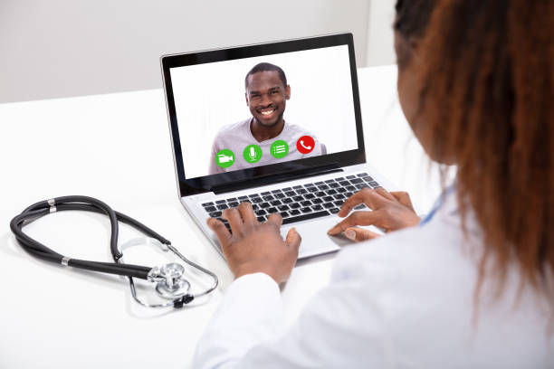 istock Doctor Video Conferencing With Male Colleague On Computer 1150345470