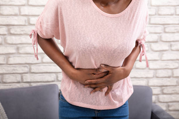 istock Young Woman Suffering From Stomachache 1150345572