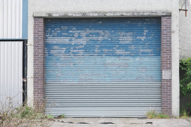 istock Roller shutter door closed business garage door 1150346664