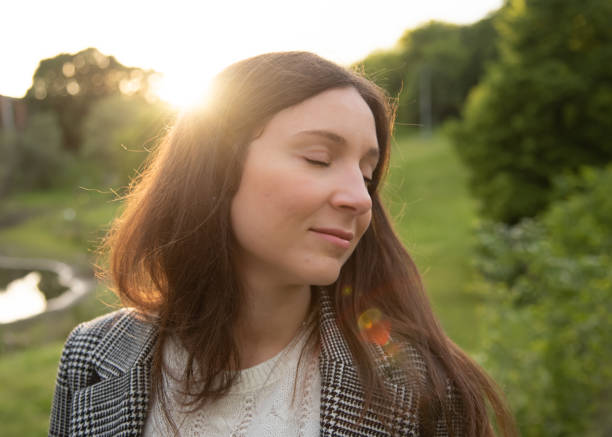 istock A woman is relaxing at the park 1150350384
