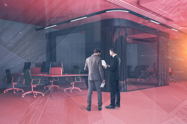 istock Men in open space office corner with meeting room 1150350652