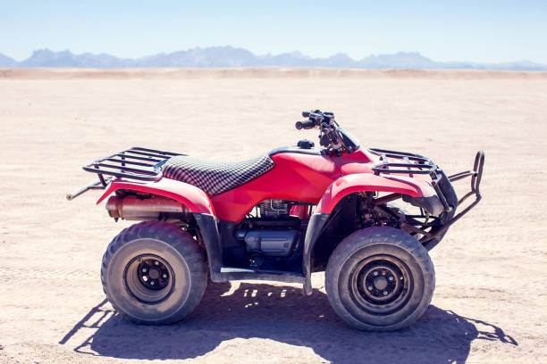 istock A group of quad bikes drive in the desert 1150351921