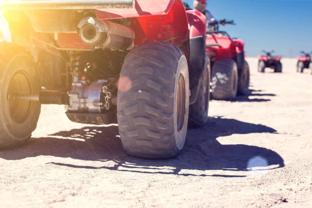 istock A group of quad bikes drive in the desert 1150351922