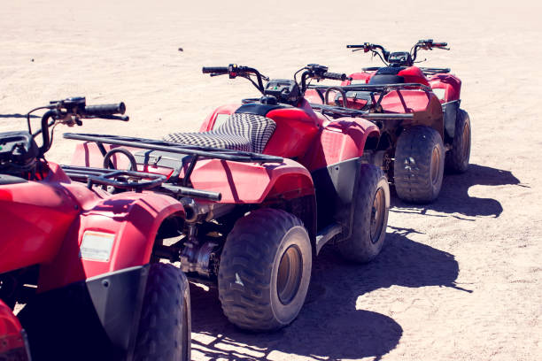 istock A group of quad bikes drive in the desert 1150351923