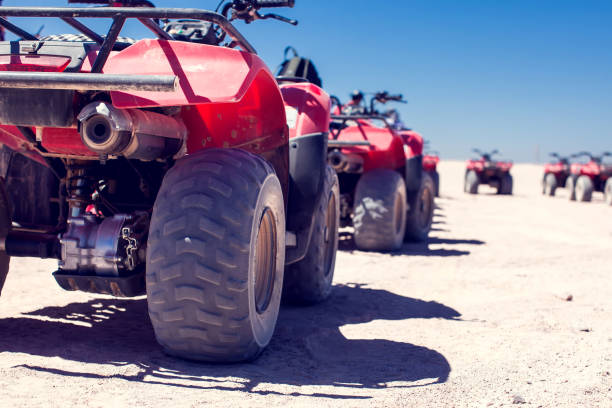 istock A group of quad bikes drive in the desert 1150351927