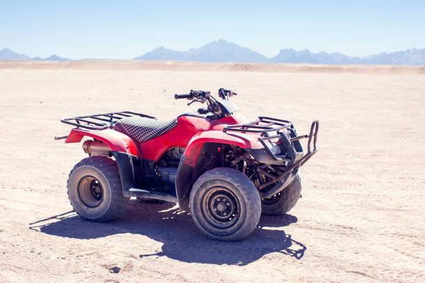 istock A group of quad bikes drive in the desert 1150352437
