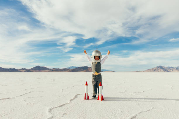 istock Little Boy Businessman with Rockets 1150352602