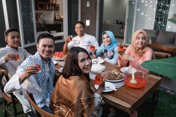 istock friends gathering enjoy the iftar meal 1150352883