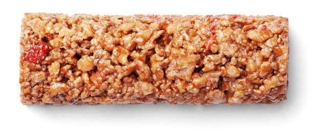 istock granola bar (muesli or cereal bar) isolated on white 1150353862