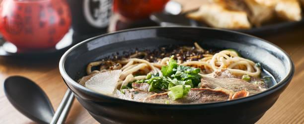 istock chinese beef soup in bowl panorama 1150355165