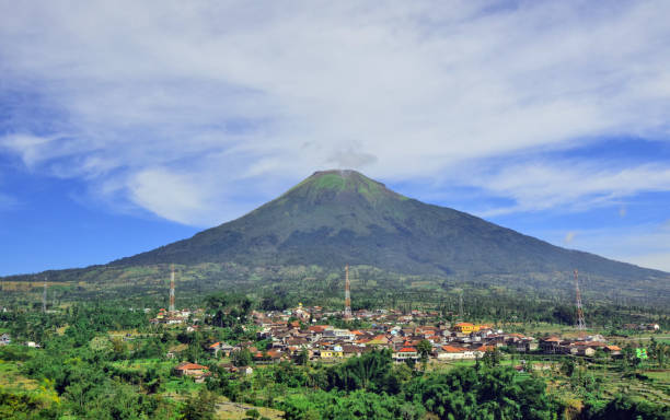 istock clean natural mountain scenery with bright blue sky with countryside below.  This mountain is called 