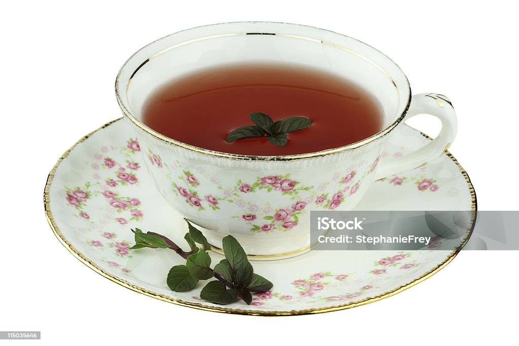 Thé dans un Antique Teacup-Expression anglo-saxonne - Photo de Blanc libre de droits