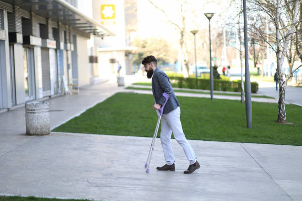 istock Young beautiful bearded man with walking sticks on the stree 1150357927