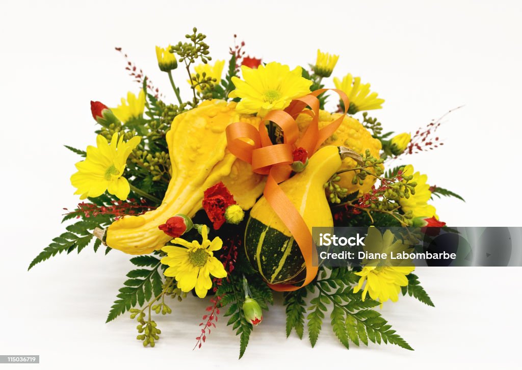 Fall Flowers and Gourds Table centerpiece of flowers and gourds Arrangement Stock Photo