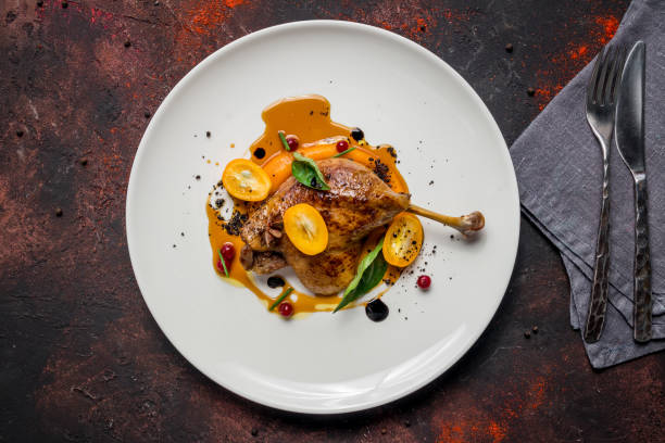Duck leg confit Duck leg confit french restaurant pictures stock pictures, royalty-free photos & images