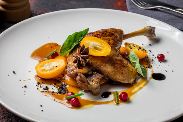 Duck leg confit Duck leg confit confit stock pictures, royalty-free photos & images