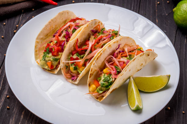 istock Mexican tacos with vegetables vegetarian 1150369757